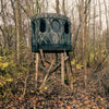 Image of Blind in a forest setting with camouflage pattern