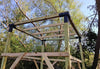 Image of Wooden frame structure in a forest setting